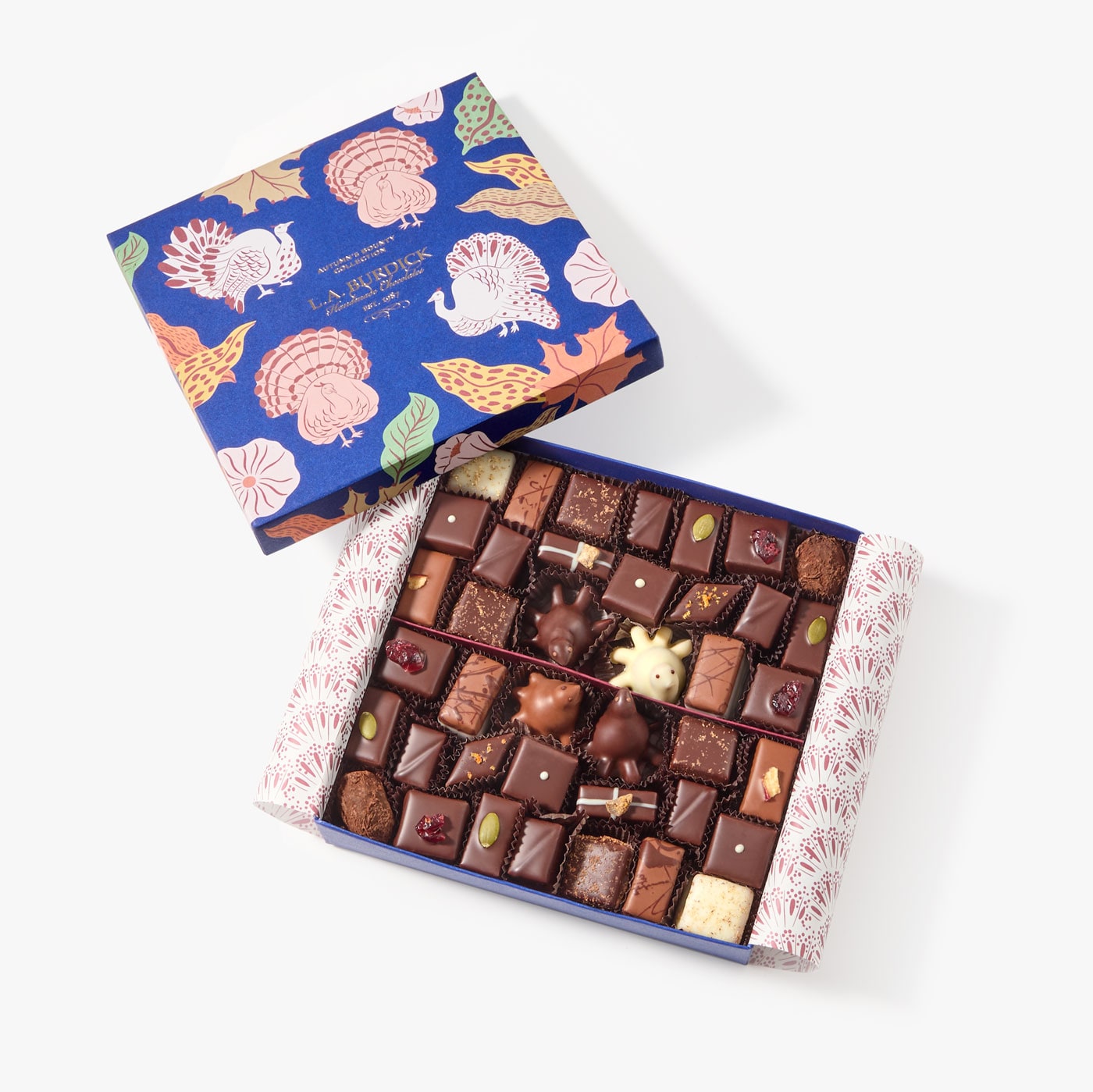 Large chocolate assortment of handmade bonbons packaged inside our beautifully illustrated Thanksgiving gift box.